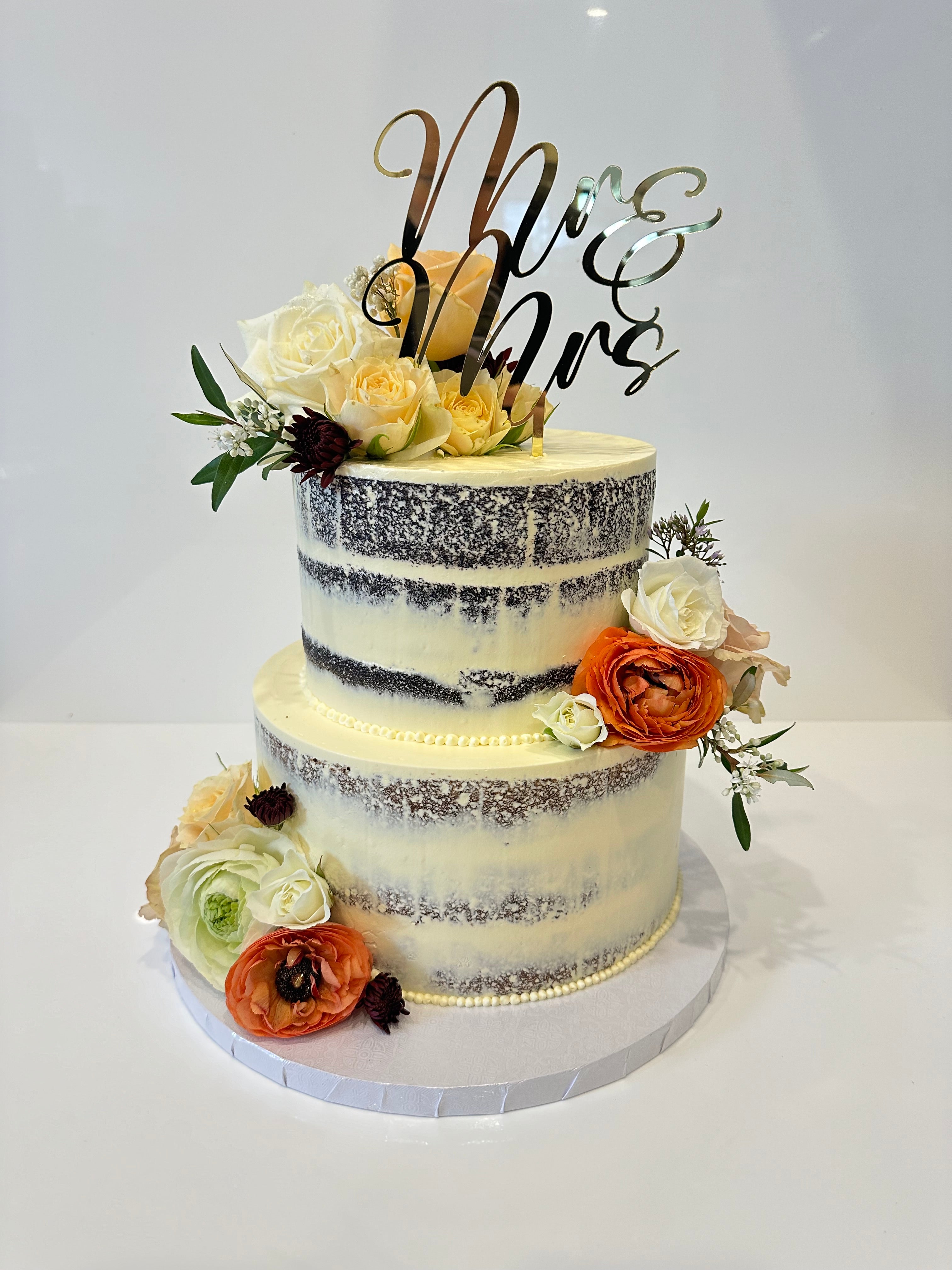 Semi naked wedding cake – The Cake Shop