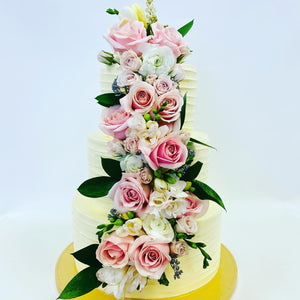 Spiral cake with floral waterfall