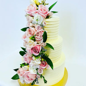 Spiral cake with floral waterfall